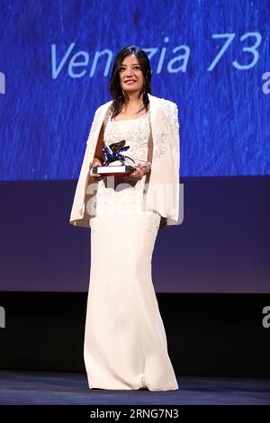 VENICE, Sept. 10, 2016 -- Member of the Jury, Chinese actress Zhao Wei gets ready to present the Silver Lion award for Best Director to director Andrei Konchalovsky for his movie Paradise during the award ceremony at the 73rd Venice Film Festival, at the Lido of Venice, Italy, Sept. 10, 2016. )(axy) ITALY-VENICE-73RD FILM FESTIVAL-AWARD CEREMONY-ZHAO WEI JinxYu PUBLICATIONxNOTxINxCHN   Venice Sept 10 2016 member of The Jury Chinese actress Zhao Wei GETS Ready to Present The Silver Lion Award for Best Director to Director Andrei Konchalovsky for His Movie Paradise during The Award Ceremony AT T Stock Photo