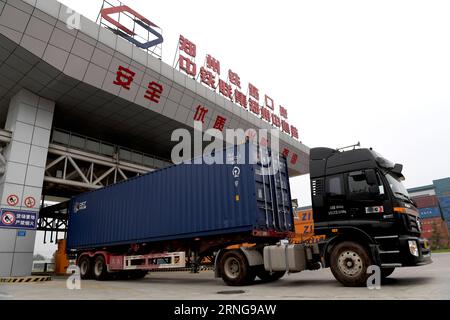 (160914) -- BEIJING, Sept. 14, 2016 -- A lorry carrying a container runs out of the container terminal of Zhengzhou railway in Zhengzhou, capital of central China s Henan Province, Aug. 18, 2016. Zhengzhou is one of the Chinese cities having direct cargo trains to Europe. Starting from Zhengzhou, a logistics center and transport hub in Henan, the 10,214-kilometer Zhengzhou-Europe international shuttle train crosses the border at the Alataw Pass in Xinjiang before passing through Kazakhstan, Russia, Belarus and Poland on its way to Germany s Hamburg. The Zhengzhou-Europe express railway service Stock Photo