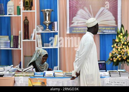 (160921) -- NAIROBI, Sept. 21, 2016 -- A visitor chooses books at the 19th Nairobi International Book Fair in Nairobi, Kenya, Sept. 21, 2016. Being one of the oldest book fairs in eastern Africa, the 5-day 19th Nairobi International Book Fair kicked off here on Wednesday with publishers from across the continent and the world as well. ) KENYA-NAIROBI-BOOK FAIR SunxRuibo PUBLICATIONxNOTxINxCHN   Nairobi Sept 21 2016 a Visitor Chooses Books AT The 19th Nairobi International Book Fair in Nairobi Kenya Sept 21 2016 Being One of The Oldest Book Fairs in Eastern Africa The 5 Day 19th Nairobi Interna Stock Photo