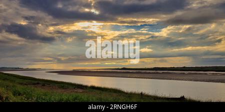 Sunset over Cobequid Bay. An inlet of the Bay of Fundy and the easternmost part of the Minas Basin, located in the Canadian province of Nova Scotia. Stock Photo