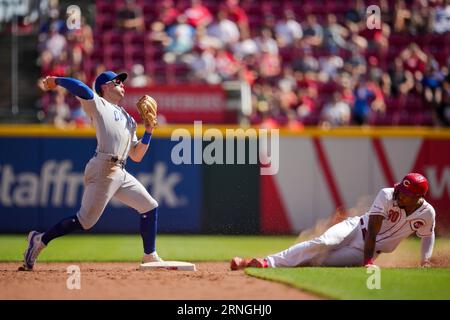 Chicago Cubs' Seiya Suzuki, left, is congratulated by first base coach Mike  Napoli after hitting a single against the San Francisco Giants during the  eighth inning of a baseball game in San