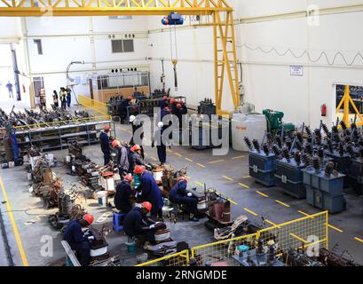 (161006) -- NAIROBI, Oct. 6, 2016 -- Kenyan technicians work at Yocean manufacturing transformers factory on the outskirts of Nairobi, Kenya, on Oct. 5, 2016. Kenya s first transfomer-manufacturing plant, set up by Chinese company Yocean Group, opened on Wednesday. Kenya has been relying on transformers from abroad, mostly from India. Kenya s Cabinet Secretary for Energy and Petroleum, Charles Keter, said the plant will ease procurement of transformers and other electrical appliances. ) (dtf) KENYA-NAIROBI-ENERGY-CHINA-TRANSFORMER PanxSiwei PUBLICATIONxNOTxINxCHN   Nairobi OCT 6 2016 Kenyan Te Stock Photo