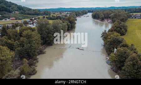 Aerial drone view of collapsed rope bridge close to Medno in Ljubljana, after heavy floods hit slovenia in the summer of 2023. Destroyed bridge over S Stock Photo