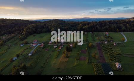 Picturesque village of Reber in dolenjska region of Slovenia on a sunny evening sunset,with visible typical small houses or weekend homes called Zidan Stock Photo