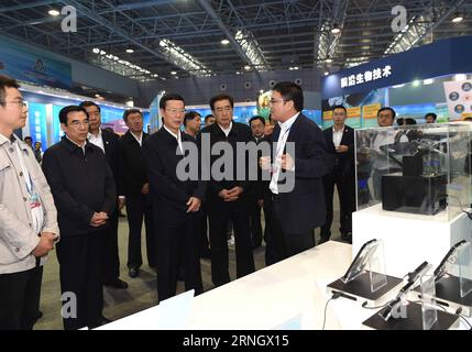 (161014) -- BEIJING, Oct. 14, 2016 -- Chinese Vice Premier Zhang Gaoli visits an exhibition on National Mass Innovation and Entrepreneurship Week before attending the 4th China Venture Capital Forum in Beijing, capital of China, Oct. 14, 2016. ) (zhs) CHINA-BEIJING-ZHANG GAOLI-VENTURE CAPITAL FORUM (CN) RaoxAimin PUBLICATIONxNOTxINxCHN   161014 Beijing OCT 14 2016 Chinese Vice Premier Zhang Gaoli visits to Exhibition ON National Mass Innovation and Entrepreneurship Week Before attending The 4th China Venture Capital Forum in Beijing Capital of China OCT 14 2016 zhs China Beijing Zhang Gaoli Ve Stock Photo