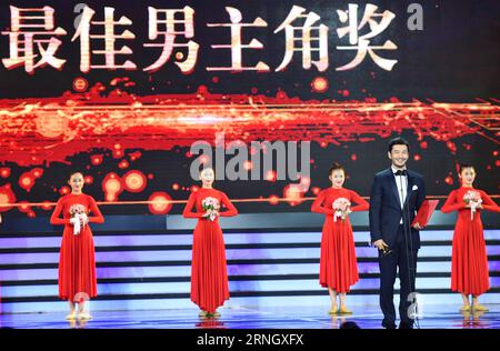(161015) -- CHANGCHUN, Oct. 15, 2016 -- Actor Huang Xiaoming, winner for Best Actor, attends the closing ceremony of the Changchun Film Festival in Changchun, northeast China s Jilin Province, Oct. 15, 2016. The film festival closed here Saturday. Chinese film stars Huang Xiaoming and Bai Baihe won the festival s best actor and actress awards. Hong Kong film director Derek Tung-Shing Yee was honored the best director s award. The best Chinese language film award was conferred to Xuan Zang . ) (yxb) CHINA-JILIN-CHANGCHUN FILM FESTIVAL-CLOSING (CN) XuxChang PUBLICATIONxNOTxINxCHN   161015 Changc Stock Photo