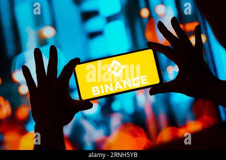 In this photo illustration, the Binance logo is displayed on a smartphone screen. Stock Photo