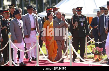 (161102) -- KATHMANDU, Nov. 2, 2016 -- Indian President Pranab Mukherjee (2nd R, front) along with Nepalese President Bidhya Devi Bhandari (3rd R, front) review the guard of honor during a welcoming ceremony at the Tribhuvan International Airport in Kathmandu, capital of Nepal, Nov. 2, 2016. Indian President Pranab Mukherjee arrived in Kathmandu on Wednesday for a three-day state visit to Nepal at the invitation of his Nepali counterpart Bidhya Devi Bhandari. ) (sxk) NEPAL-KATHMANDU-INDIAN PRESIDENT-VISIT SunilxSharma PUBLICATIONxNOTxINxCHN   Kathmandu Nov 2 2016 Indian President Pranab Mukher Stock Photo