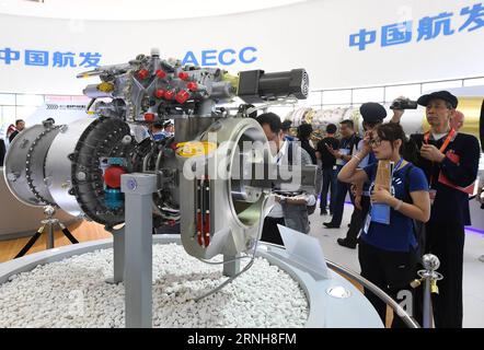 (161102) -- ZHUHAI, Nov. 2, 2016 -- Visitors look at China s first self-developed turboshaft engine on Zhuhai Airshow of south China s Guangdong Province, Nov. 2, 2016. ) (wyl) CHINA-ZHUHAI-AIRSHOW-TURBOSHAFT ENGINE (CN) LixHe PUBLICATIONxNOTxINxCHN   Zhuhai Nov 2 2016 Visitors Look AT China S First Self Developed Turboshaft Engine ON Zhuhai Airshow of South China S Guangdong Province Nov 2 2016 wyl China Zhuhai Airshow Turboshaft Engine CN LixHe PUBLICATIONxNOTxINxCHN Stock Photo