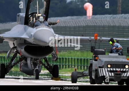 A Republic of Singapore air force pilot conducts a mass briefing for ...