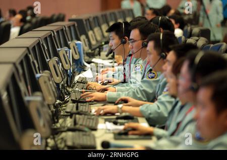 (161118) -- BEIJING, Nov. 18, 2016 -- Technicians work at the Beijing Aerospace Control Center (BACC) in Beijing, capital of China, Nov. 18, 2016. Two astronauts who completed China s longest-ever manned space mission returned to Earth safely Friday afternoon, according to the BACC. ) (mcg) CHINA-SHENZHOU-11-RETURN (CN) CaixYang PUBLICATIONxNOTxINxCHN   Beijing Nov 18 2016 Technicians Work AT The Beijing Aerospace Control Center BACC in Beijing Capital of China Nov 18 2016 Two astronauts Who completed China S LONGEST Ever Manned Space Mission Returned to Earth Safely Friday Noon According to T Stock Photo