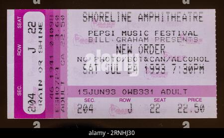 Mountain View, California - July 24, 1993 - Old used ticket stub for New Order concert at Shoreline Amphitheatre Stock Photo