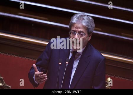 Italien: Senat spricht neuer Regierung das Vertrauen aus (161214) -- ROME, Dec. 14, 2016 -- Italian Prime Minister Paolo Gentiloni gives a speech ahead of a confidence vote at the upper house in Rome, capital of Italy, on Dec. 14, 2016. The new cabinet of Italian Prime Minister Paolo Gentiloni won the second of two confidence votes on Wednesday, paving the way for formally taking over the power. ) ITALY-ROME-SENATE-GENTILONI-CONFIDENCE VOTE-WINNING JinxYu PUBLICATIONxNOTxINxCHN   Italy Senate speaks later Government the Trust out 161214 Rome DEC 14 2016 Italian Prime Ministers Paolo Gentiloni Stock Photo