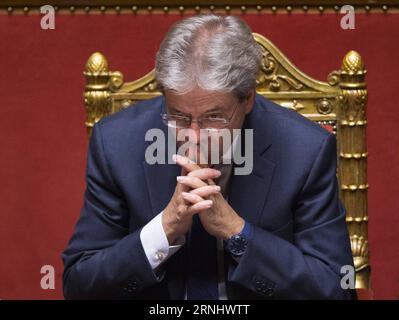Italien: Senat spricht neuer Regierung das Vertrauen aus (161214) -- ROME, Dec. 14, 2016 -- Italian Prime Minister Paolo Gentiloni is seen ahead of a confidence vote at the upper house in Rome, capital of Italy, on Dec. 14, 2016. The new cabinet of Italian Prime Minister Paolo Gentiloni won the second of two confidence votes on Wednesday, paving the way for formally taking over the power. ) ITALY-ROME-SENATE-GENTILONI-CONFIDENCE VOTE-WINNING JinxYu PUBLICATIONxNOTxINxCHN   Italy Senate speaks later Government the Trust out 161214 Rome DEC 14 2016 Italian Prime Ministers Paolo Gentiloni IS Lake Stock Photo