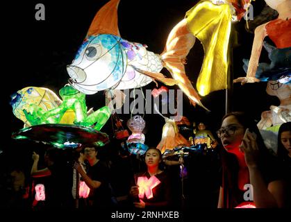 (161217) -- QUEZON CITY, Dec. 16, 2016 -- Students march with colorful lanterns during the annual Lantern Parade at the University of the Philippines in Quezon City, the Philippines, Dec. 16, 2016. The annual Lantern Parade showcases colorful floats, lanterns, street performances, various costumes and spectacular fireworks in celebration of the start of the Christmas break for students. ) (zw) PHILIPPINES-QUEZON CITY-LANTERN PARADE RouellexUmali PUBLICATIONxNOTxINxCHN   Quezon City DEC 16 2016 Students March With Colorful Lanterns during The Annual Lantern Parade AT The University of The Phili Stock Photo