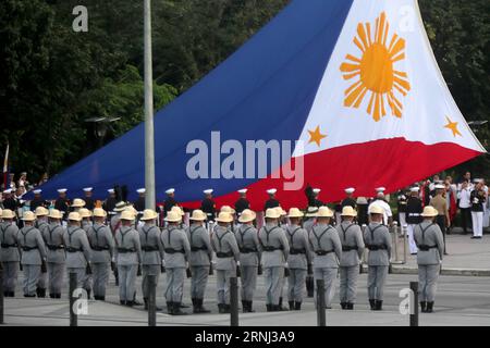 (161230) -- MANILA, Dec. 30, 2016 -- Soldiers hoist the Philippine national flag during the commemoration of the 120th death anniversary of Philippine national hero Jose Rizal in Manila, the Philippines, Dec. 30, 2016. Philippine national hero Jose Rizal, hailed as a great Philippine patriot, was the forerunner of the country s independence movement. He was shot and killed by Spanish colonialists on Dec. 30, 1896. ) (zy) PHILIPPINES-MANILA-JOSE RIZAL-COMMEMORATION RouellexUmali PUBLICATIONxNOTxINxCHN   Manila DEC 30 2016 Soldiers hoist The Philippine National Flag during The Commemoration of T Stock Photo