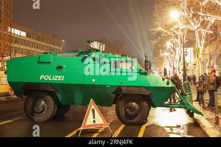 (170101) -- BERLIN, Jan. 1, 2017 -- A police vehicle blocks a road near the Brandenburg Gate during the New Year s celebrations in Berlin, Germany, on Dec. 31, 2016. ) (zy) GERMANY-BERLIN-NEW YEAR-SECURITY ShanxYuqi PUBLICATIONxNOTxINxCHN   Berlin Jan 1 2017 a Police Vehicle Blocks a Road Near The Brandenburg Gate during The New Year S celebrations in Berlin Germany ON DEC 31 2016 ZY Germany Berlin New Year Security  PUBLICATIONxNOTxINxCHN Stock Photo