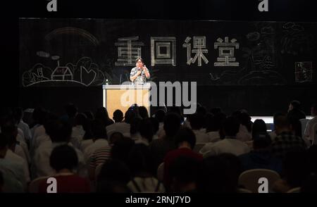 (170106) -- SANYA, Jan. 6, 2017 -- Gao Xiaosong, Chinese-language composer and music producer, speaks at the Back to Class event held by Jack Ma Foundation in Sanya, south China s Hainan Province, Jan. 6, 2017. A total of 100 rural teachers selected by the foundation as 2016 Jack Ma Rural Teacher Initiative winners attended the event on Friday. ) (wx) CHINA-HAINAN-SANYA-JACK MA FOUNDATION-RURAL TEACHERS (CN) YangxGuanyu PUBLICATIONxNOTxINxCHN   Sanya Jan 6 2017 Gao Xiao Song Chinese Language Composer and Music Producer Speaks AT The Back to Class Event Hero by Jack MA Foundation in Sanya South Stock Photo