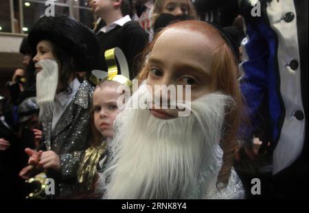 JERUSALEM, Ultra-Orthodox Jewish children celebrate Purim at a synagogue in Mea Shearim, Jerusalem, on March 13, 2017. Purim is a Jewish holiday that commemorates the deliverance of the Jewish people from Haman s plot during the reign of the ancient Persian Empire, according to the Biblical Book of Esther. Gil Cohen Magen) (yy) MIDEAST-JERUSALEM-PURIM-CELEBRATION guoyu PUBLICATIONxNOTxINxCHN   Jerusalem Ultra Orthodox Jewish Children Celebrate Purim AT a Synagogue in MEA Shearim Jerusalem ON March 13 2017 Purim IS a Jewish Holiday Thatcher Commemorates The Deliverance of The Jewish Celebrities Stock Photo