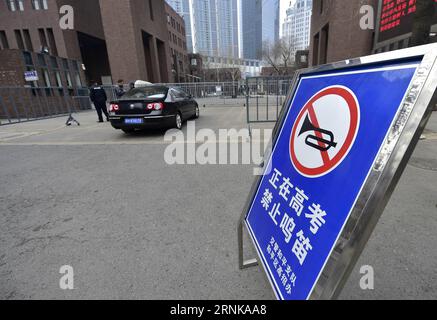 (170317) -- TIANJIN, March 17, 2017 -- A warning board reading exam ongoing, no whistle is set outside the Tianjin Yaohua Middle School in Tianjin, north China, March 17, 2017. Students took part in the first test for English as part of China s National College Entrance Examination in Tianjin on Friday. As from 2017, two oral and written tests will be held for English during the National College Entrance Examination in Tianjin, and the better scores will be chosen as the final results. ) (zwx) CHINA-TIANJIN-COLLEGE ENTRANCE EXAMINATION-ENGLISH-TWICE TESTS (CN) YuexYuewei PUBLICATIONxNOTxINxCHN Stock Photo