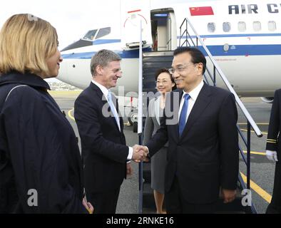 (170326) -- WELLINGTON, March 26, 2017 -- Chinese Premier Li Keqiang (1st R) arrives with his wife Cheng Hong (2nd R) in Wellington, New Zealand, March 26, 2017, for an official visit to New Zealand at the invitation of his New Zealand s counterpart Bill English. ) (lb) NEW ZEALAND-WELLINGTON-LI KEQIANG-VISIT-ARRIVAL PangxXinglei PUBLICATIONxNOTxINxCHN   Wellington March 26 2017 Chinese Premier left Keqiang 1st r arrives With His wife Cheng Hong 2nd r in Wellington New Zealand March 26 2017 for to Official Visit to New Zealand AT The Invitation of His New Zealand S Part Bill English LB New Zea Stock Photo