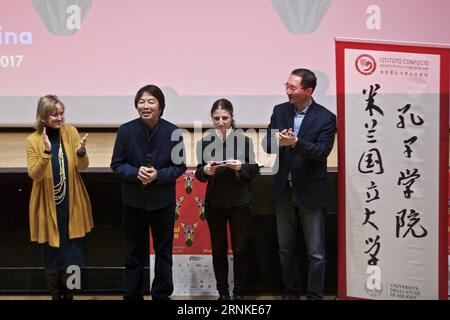 (170327) -- MILAN, March 27, 2017 -- Chinese writer Liu Zhenyun (2nd L) gives a speech before the screening of the Chinese movie I Am Not Madame Bovary , adpated from his original literature work, during the 27th Festival of African, Asian and Latin American Cinema in Milan on Sunday. From March 17 to April 4, such events are held in the Netherlands, the Czech Republic, Austria, Italy, France and Germany, presenting Chinese stories and culture to European readers. ) (gj) ITALY-MILAN-LITERATURE-CINEMA-LIU ZHENYUN JinxYu PUBLICATIONxNOTxINxCHN   Milan March 27 2017 Chinese Writer Liu Zhenyun 2nd Stock Photo