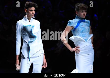 (170328) -- BEIJING, March 28, 2017 -- Models present creations designed by Gong Hangyu during China Fashion Week in Beijing, capital of China, March 28, 2017. ) (lfj) CHINA-BEIJING-FASHION WEEK (CN) LixMingfang PUBLICATIONxNOTxINxCHN   Beijing March 28 2017 Models Present Creations designed by Gong Hangyu during China Fashion Week in Beijing Capital of China March 28 2017 lfj China Beijing Fashion Week CN LixMingfang PUBLICATIONxNOTxINxCHN Stock Photo