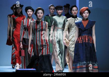 (170328) -- BEIJING, March 28, 2017 -- Models present creations designed by Gong Hangyu during China Fashion Week in Beijing, capital of China, March 28, 2017. ) (lfj) CHINA-BEIJING-FASHION WEEK (CN) LixMingfang PUBLICATIONxNOTxINxCHN   Beijing March 28 2017 Models Present Creations designed by Gong Hangyu during China Fashion Week in Beijing Capital of China March 28 2017 lfj China Beijing Fashion Week CN LixMingfang PUBLICATIONxNOTxINxCHN Stock Photo