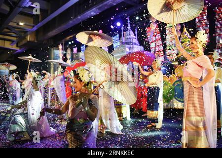 (170409) -- BANGKOK, April 9, 2017 -- Performers dance during the Amazing Songkran Joyful Procession in Bangkok, Thailand, April 8, 2017. The celebration of Songkran kicked off on Saturday as the Amazing Songkran Joyful Procession took place in downtown Bangkok. The event, held by the Tourism Authority of Thailand, presented the audience with street performances and festive floats that offered a glimpse into the country s Songkran culture. Songkran festival, or the Thai New Year, lasts from April 13 to 15. ) (hy) THAILAND-BANGKOK-SONGKRAN FESTIVAL-CELEBRATION-PROCESSION LixMangmang PUBLICATION Stock Photo