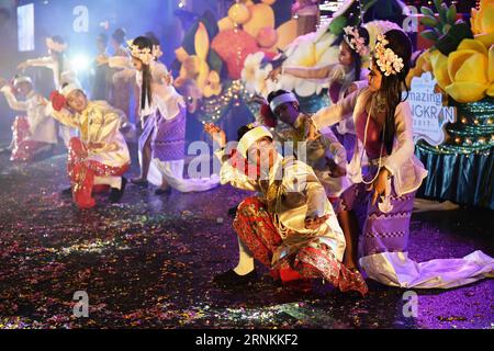 (170409) -- BANGKOK, April 9, 2017 -- Performers dance during the Amazing Songkran Joyful Procession in Bangkok, Thailand, April 8, 2017. The celebration of Songkran kicked off on Saturday as the Amazing Songkran Joyful Procession took place in downtown Bangkok. The event, held by the Tourism Authority of Thailand, presented the audience with street performances and festive floats that offered a glimpse into the country s Songkran culture. Songkran festival, or the Thai New Year, lasts from April 13 to 15. ) (hy) THAILAND-BANGKOK-SONGKRAN FESTIVAL-CELEBRATION-PROCESSION LixMangmang PUBLICATION Stock Photo