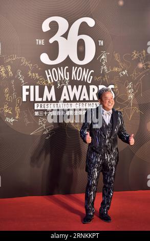 Hong Kong actor Eric Tsang and Taiwanese hostess Bowie Tsang pose