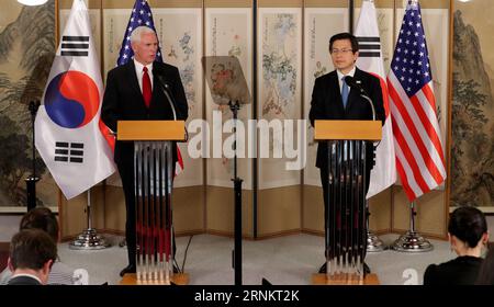 (170418) -- SEOUL, April 18, 2017 -- U.S. Vice President Mike Pence (L) and South Korean Prime Minister Hwang Kyo-ahn, who is serving as the acting South Korean president, attend a joint press conference in Seoul, South Korea, on April 17, 2017. Visiting U.S. Vice President Mike Pence said Monday that an era of strategic patience is over on the Democratic People s Republic of Korea (DPRK). South Korean Action President and Prime Minister office-) (zxj) KOREA OUT SOUTH KOREA-SEOUL-U.S.-MIKE PENCE-VISIT pool PUBLICATIONxNOTxINxCHN   Seoul April 18 2017 U S Vice President Mike Pence l and South K Stock Photo