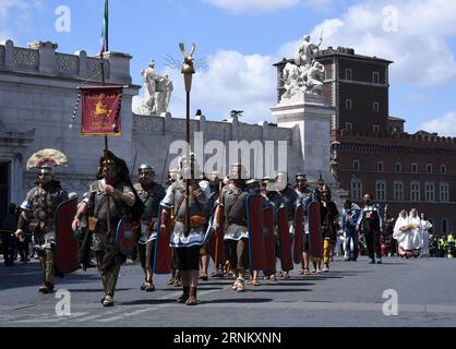 (170424) -- ROME, April 24, 2017 -- Performers take part in a parade in Rome, capital of Italy, April 23, 2016. The city of Rome turned 2770 Friday after its legendary foundation by Romulus in 753 BC. People celebrate the Birth of Rome with parades in costume, re-enacting the deeds of the great ancient Roman Empire, along the ancient Roman ruins of the Colosseum, Circus Maximus, Roman Forum and Venice Square. ) (zy) ITALY-ROME-FOUNDATION-2770TH ANNIVERSARY AlbertoxLingria PUBLICATIONxNOTxINxCHN   Rome April 24 2017 Performers Take Part in a Parade in Rome Capital of Italy April 23 2016 The Cit Stock Photo