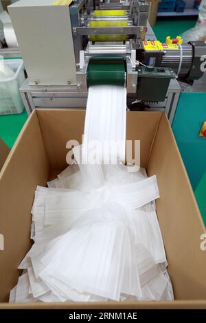 the production line in a Medical mask factory Stock Photo