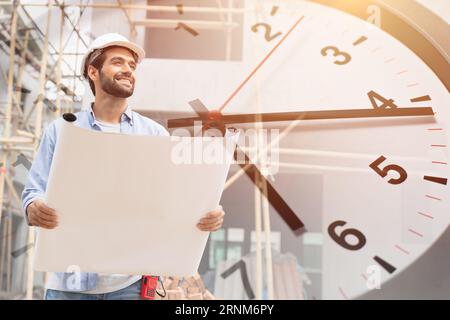 Happy construction project engineer manager overlay with time clock for good control timing punctual building house renovate concept Stock Photo