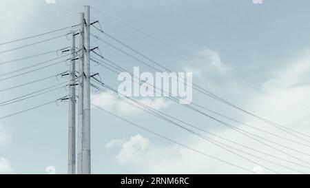 Monopoles Electric Transmission Poles for Hight voltage long range energy transport for urban city metro power infrastructure landscape view Stock Photo
