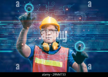 engineer male happy using modern advance technology display touch screen hologram graphic interface control operate machine factory industry Stock Photo