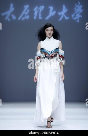 (170518) -- BEIJING, May 18, 2017 -- A model presents a creation designed by graduates of Taiyuan University of Technology during China Graduate Fashion Week in Beijing, capital of China, May 17, 2017. )(wyo) CHINA-BEIJING-GRADUATE FASHION WEEK (CN) ChenxJianli PUBLICATIONxNOTxINxCHN   Beijing May 18 2017 a Model Presents a Creation designed by graduates of Taiyuan University of Technology during China Graduate Fashion Week in Beijing Capital of China May 17 2017 wyo China Beijing Graduate Fashion Week CN ChenxJianli PUBLICATIONxNOTxINxCHN Stock Photo