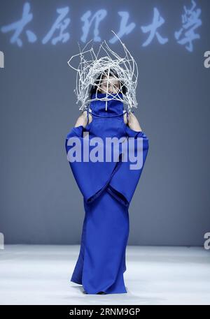 (170518) -- BEIJING, May 18, 2017 -- A model presents a creation designed by graduates of Taiyuan University of Technology during China Graduate Fashion Week in Beijing, capital of China, May 17, 2017. )(wyo) CHINA-BEIJING-GRADUATE FASHION WEEK (CN) ChenxJianli PUBLICATIONxNOTxINxCHN   Beijing May 18 2017 a Model Presents a Creation designed by graduates of Taiyuan University of Technology during China Graduate Fashion Week in Beijing Capital of China May 17 2017 wyo China Beijing Graduate Fashion Week CN ChenxJianli PUBLICATIONxNOTxINxCHN Stock Photo