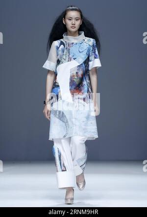 (170518) -- BEIJING, May 18, 2017 -- A model presents a creation designed by graduates of Taiyuan University of Technology during China Graduate Fashion Week in Beijing, capital of China, May 17, 2017. )(wyo) CHINA-BEIJING-GRADUATE FASHION WEEK (CN) ChenxJianli PUBLICATIONxNOTxINxCHN   Beijing May 18 2017 a Model Presents a Creation designed by graduates of Taiyuan University of Technology during China Graduate Fashion Week in Beijing Capital of China May 17 2017 wyo China Beijing Graduate Fashion Week CN ChenxJianli PUBLICATIONxNOTxINxCHN Stock Photo