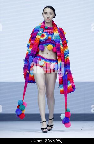 (170518) -- BEIJING, May 18, 2017 -- A model presents a creation designed by graduates of Sino-French IFA Institute of Fashion Designer of Shanghai University of Engineering Science at the China Graduate Fashion Show in Beijing, capital of China, May 18, 2017. ) (lb) CHINA-BEIJING-CHINA GRADUATE FASHION SHOW (CN) ChenxJianli PUBLICATIONxNOTxINxCHN   Beijing May 18 2017 a Model Presents a Creation designed by graduates of SINO French IFA Institute of Fashion Designers of Shanghai University of Engineering Science AT The China Graduate Fashion Show in Beijing Capital of China May 18 2017 LB Chin Stock Photo