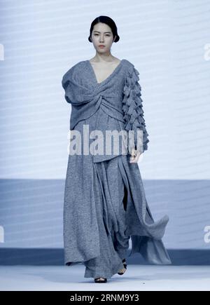 (170518) -- BEIJING, May 18, 2017 -- A model presents a creation designed by graduates of Sino-French IFA Institute of Fashion Designer of Shanghai University of Engineering Science at the China Graduate Fashion Show in Beijing, capital of China, May 18, 2017. ) (lb) CHINA-BEIJING-CHINA GRADUATE FASHION SHOW (CN) ChenxJianli PUBLICATIONxNOTxINxCHN   Beijing May 18 2017 a Model Presents a Creation designed by graduates of SINO French IFA Institute of Fashion Designers of Shanghai University of Engineering Science AT The China Graduate Fashion Show in Beijing Capital of China May 18 2017 LB Chin Stock Photo