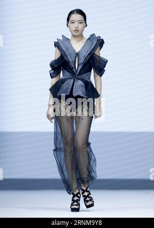 (170518) -- BEIJING, May 18, 2017 -- A model presents a creation designed by graduates of Sino-French IFA Institute of Fashion Designer of Shanghai University of Engineering Science at the China Graduate Fashion Show in Beijing, capital of China, May 18, 2017. ) (lb) CHINA-BEIJING-CHINA GRADUATE FASHION SHOW (CN) ChenxJianli PUBLICATIONxNOTxINxCHN   Beijing May 18 2017 a Model Presents a Creation designed by graduates of SINO French IFA Institute of Fashion Designers of Shanghai University of Engineering Science AT The China Graduate Fashion Show in Beijing Capital of China May 18 2017 LB Chin Stock Photo