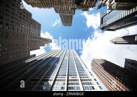 (170520) -- NEW YORK, May 20, 2017 -- Photo taken on May 15, 2017 shows the 28 Liberty (down), a property purchased by Chinese investment company Fosun in downtown Manhattan, New York, the United States on May 15, 2017. 28 Liberty Street in the downtown Manhattan Financial District, formerly known as One Chase Manhattan Plaza, now houses U.S. headquarters of Fosun, a Chinese investment company. Fosun purchased the building from J.P.Morgan for $725 million U.S. dollars in 2013 and renamed it as 28 Liberty. Fosun has made a total of 3 billion dollars investment in the United States since 2012, s Stock Photo