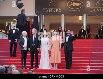 (170521) -- CANNES, May 21, 2017 -- (From L to R) French director and producer Claire Denis, South Korean director Hong Sang-soo, French actress Isabelle Huppert, South Korean actress Kim Min-hee and South Korean actor Jeong Jin-young pose on the red carpet for the screening of the film The Meyerowitz Stories in competition at the 70th Cannes International Film Festival in Cannes, France, on May 21, 2017. ) FRANCE-CANNES-FILM FESTIVAL- THE MEYEROWITZ STORIES -RED CARPET XuxJinquan PUBLICATIONxNOTxINxCHN   Cannes May 21 2017 from l to r French Director and Producer Claire Denis South Korean Dir Stock Photo