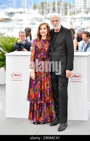 (170522) -- CANNES, May 22, 2017 -- Actress Isabelle Huppert (L) and director Michael Haneke of the film Happy End poses for photos in Cannes, France, on May 22, 2017. The film Happy End directed by Austrian director Michael Haneke will compete for the Palme d Or on the 70th Cannes Film Festival. )(zf) FRANCE-CANNES-70TH CANNES FILM FESTIVAL-IN COMPETITION-HAPPY END-PHOTOCALL ChenxYichen PUBLICATIONxNOTxINxCHN   Cannes May 22 2017 actress Isabelle Huppert l and Director Michael Haneke of The Film Happy End Poses for Photos in Cannes France ON May 22 2017 The Film Happy End Directed by Austrian Stock Photo