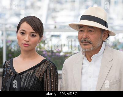 (170523) -- CANNES, May 23, 2017 -- Actress Ayame Misaki (L) and actor Tatsuya Fuji pose for a photocall of the film Hikari (Radiance) during the 70th Cannes Film Festival at Palais des Festivals in Cannes, France, on May 23, 2017. ) (dtf) FRANCE-CANNES-70TH CANNES FILM FESTIVAL-HIKARI XuxJinquan PUBLICATIONxNOTxINxCHN   Cannes May 23 2017 actress Ayame Misaki l and Actor Tatsuya Fuji Pose for a photo call of The Film Hikari Radiance during The 70th Cannes Film Festival AT Palais the Festivals in Cannes France ON May 23 2017 dtf France Cannes 70th Cannes Film Festival Hikari XuxJinquan PUBLICA Stock Photo