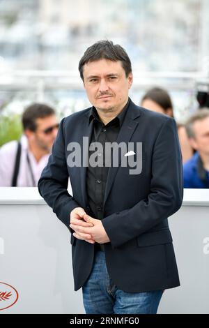 (170526) -- CANNES, May 26, 2017 -- Romanian director, screenwriter, producer, president of the jury, Cristian Mungiu, poses for a photocall in Cannes, France on May 26, 2017. The jury of Short Films and Cinefondation of the 70th Cannes Film Festival is composed by Romanian director, screenwriter, producer Cristian Mungiu, French actress Clotilde Hesme, American director, screenwriter Barry Jenkins, Singaporean director, screenwriter, producer Eric Khoo and Greek Director, screenwriter, producer Athina Rachel Tsangari. )(yk) FRANCE-CANNES-70TH CANNES FILM FESTIVAL-JURY-SHORT FILMS AND CINEFOND Stock Photo