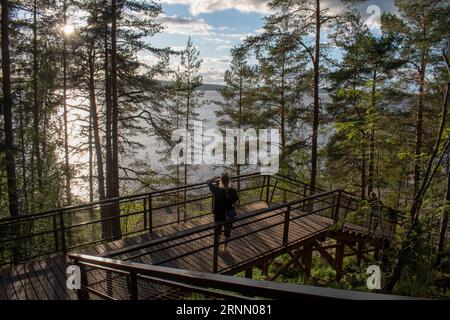 Evening view from the side of the lake to the city of Lahti, Finland, August 14, 2023. European city landscape Stock Photo