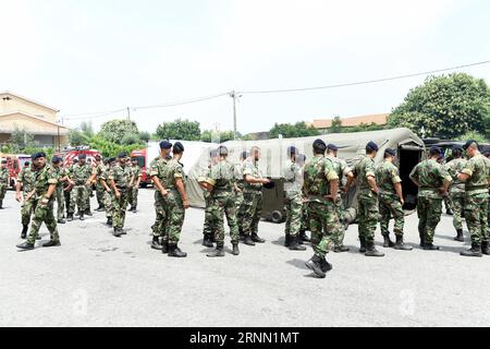 (170620) -- PEDROGAO GRANDE, June 20, 2017 -- Portuguese soldiers gather at the Fire Department in the area of Pedrogao Grande, some 150 km northeast of Lisbon, Portugal, on June 19, 2017. By Monday, 64 people including a young fire fighter were killed and 135 others were injured in the fires which erupted in Pedrogao Granda on Saturday and quickly spread into neighboring towns, making it the biggest tragedy in Portugal in more than four decades, as President Marcelo Rebelo de Sousa stated. ) (gj) PORTUGAL-FIRE-RELIEF ZhangxLiyun PUBLICATIONxNOTxINxCHN   Pedrogao Grande June 20 2017 PORTUGUESE Stock Photo